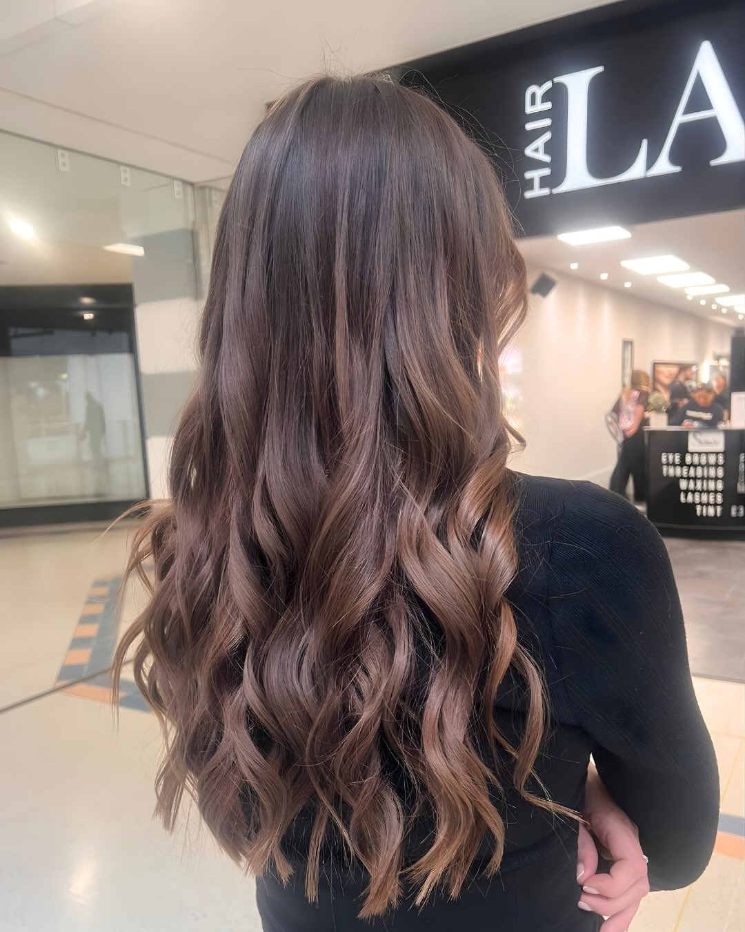 beautiful, long, glossy brown hair colour carried out by the professionals at hair lab salons in woking and basingstoke
